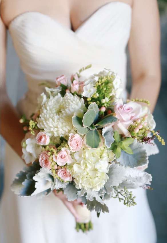 Blush rose and white hydrangea bridal bouquet with silvery foliage